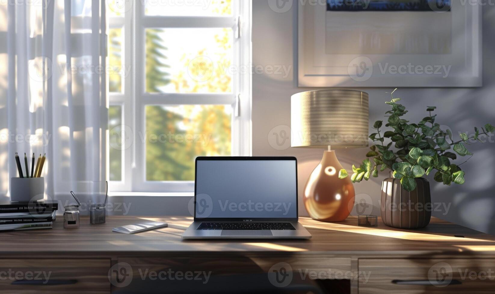 A stylish home office setup with a blank screen laptop and modern decor photo