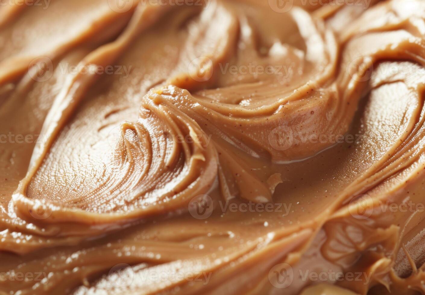 High-detail close-up of the smooth and creamy texture of peanut butter photo