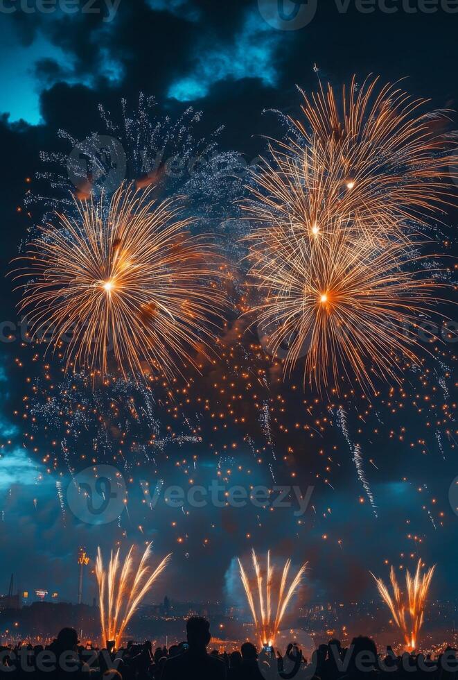 Fireworks bursting in the sky above a festive celebration, with shimmering sparks falling gracefully photo