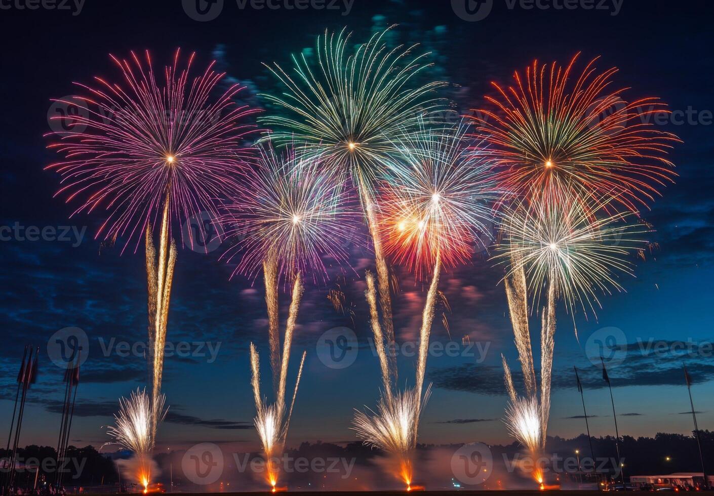 Multiple fireworks of different colors going off simultaneously, lighting up the night with vivid patterns photo