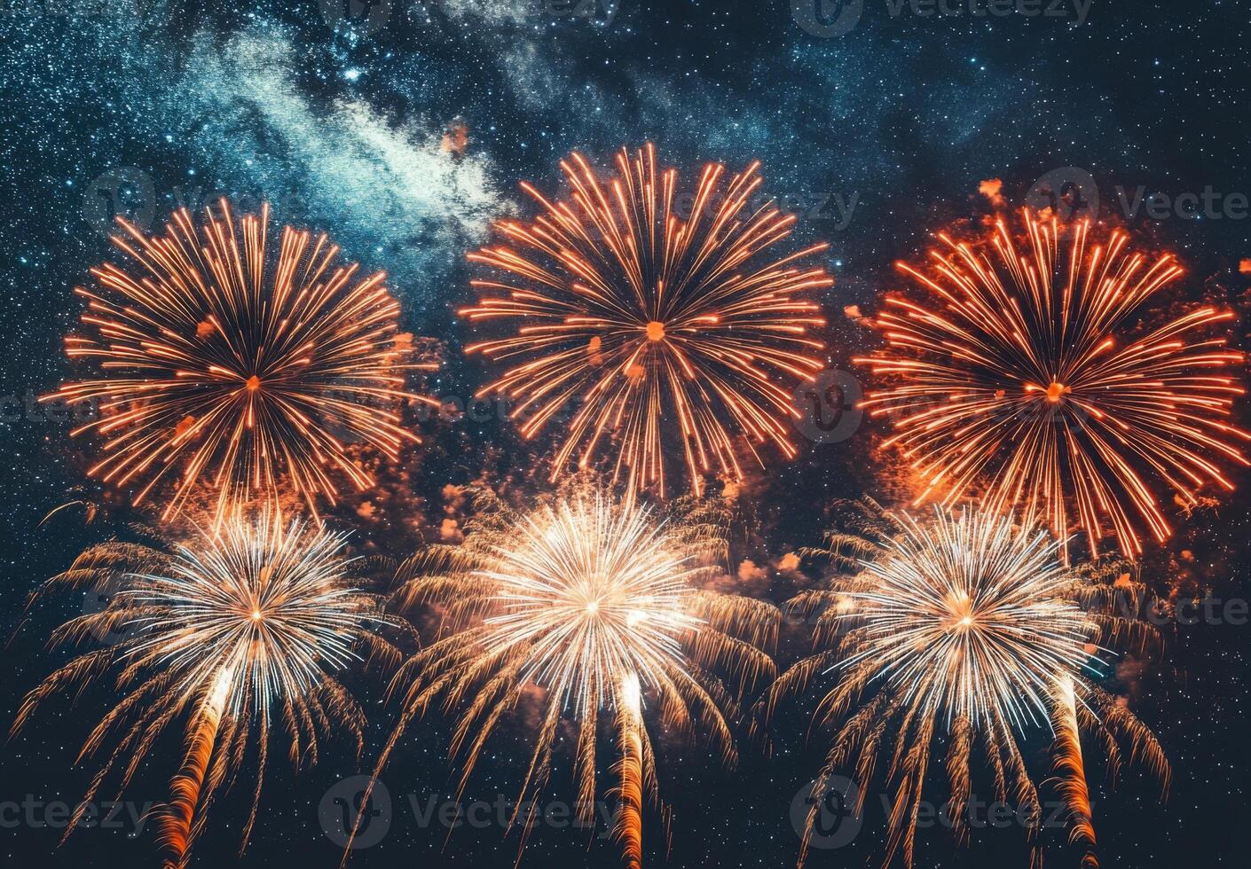 A panoramic view of fireworks with sparkling colors, creating a festive atmosphere against a starry night photo