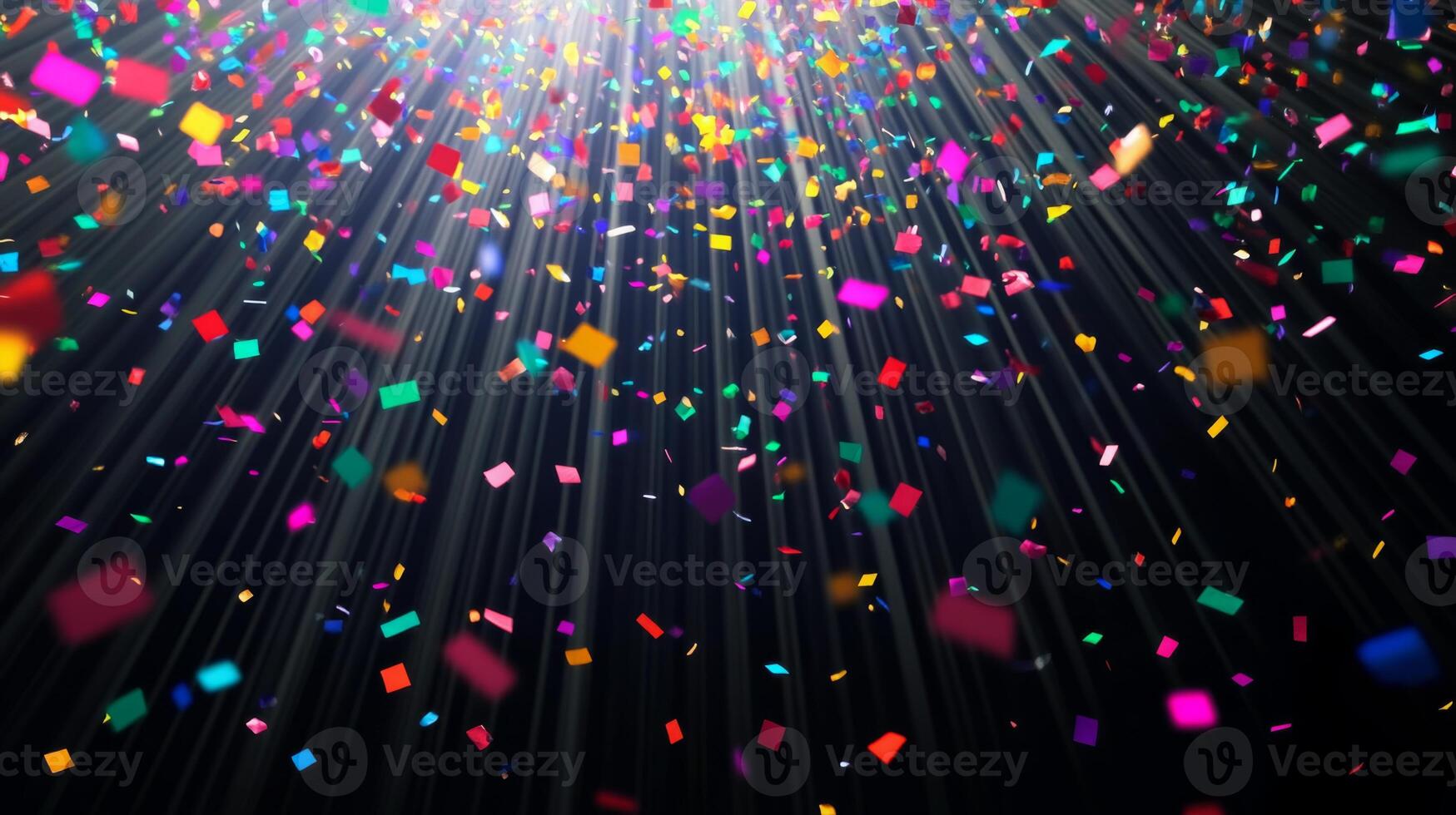 Colorful confetti suspended mid-air, with beams of light fanning out and illuminating the particles as they fall against a black void photo