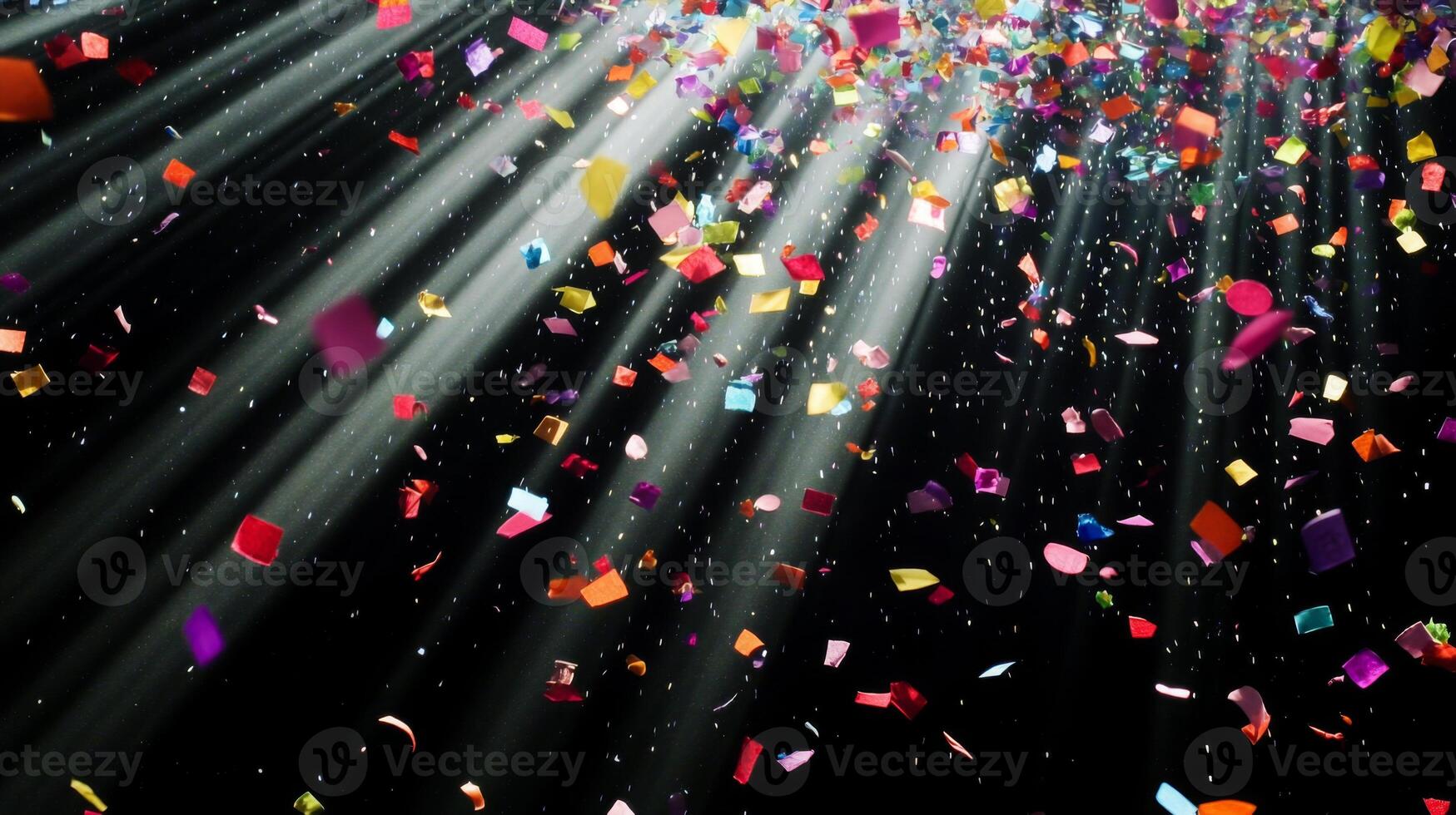 Multicolored confetti raining down against a black backdrop, with dramatic light rays streaming through the scene, casting shadows and reflections photo