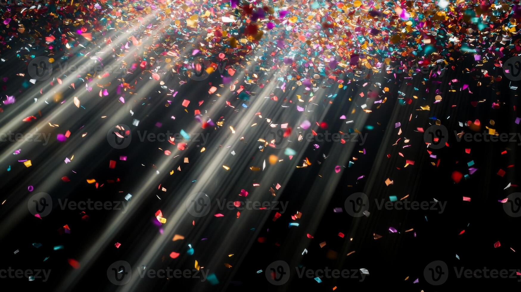Multicolored confetti raining down against a black backdrop, with dramatic light rays streaming through the scene, casting shadows and reflections photo