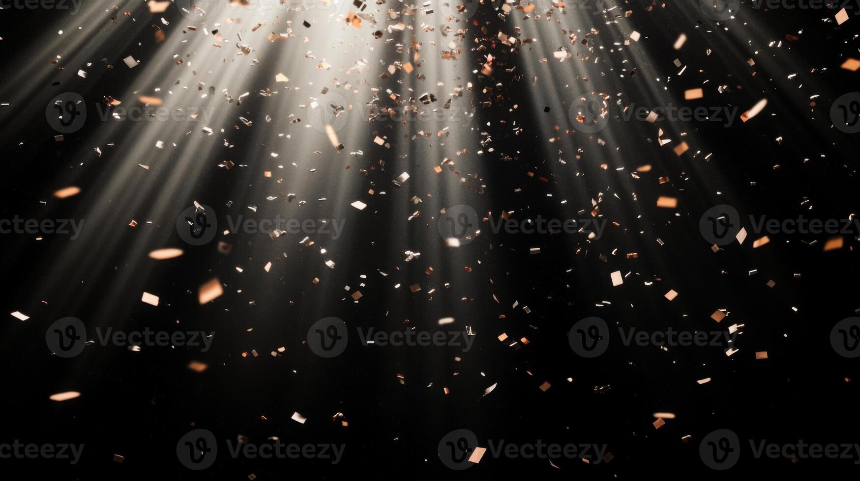 Abstract image of falling confetti illuminated by soft, scattered light rays, creating a magical and ethereal atmosphere over a black background photo