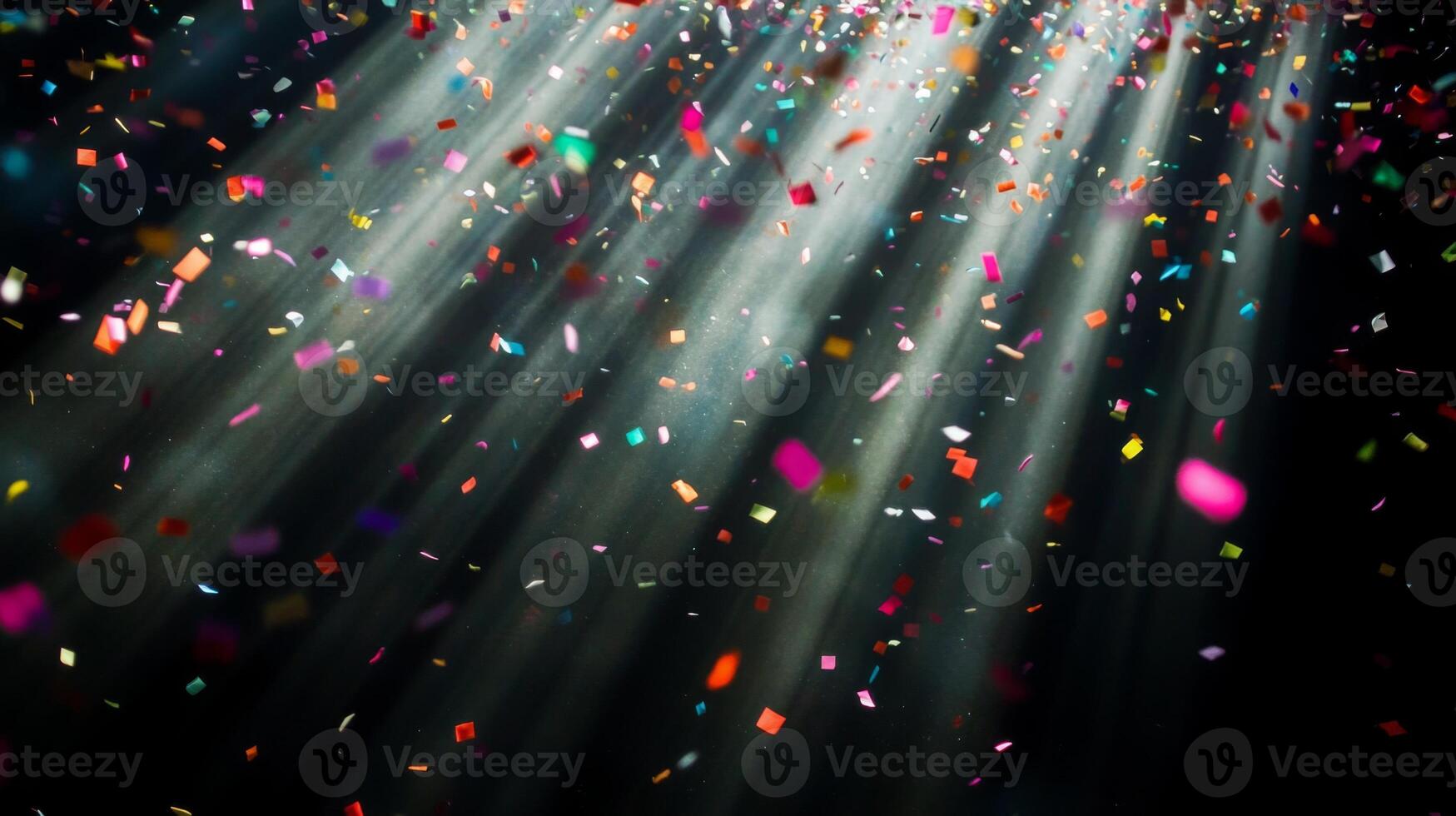 Soft, multicolored confetti drifting through shafts of light, with the dark background creating a stark, captivating contrast photo