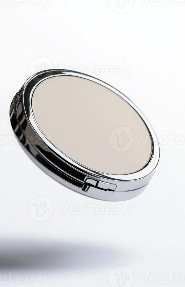 A flat cosmetic compact case levitating in mid-air, with clean edges and smooth reflections, isolated on a bright white background photo