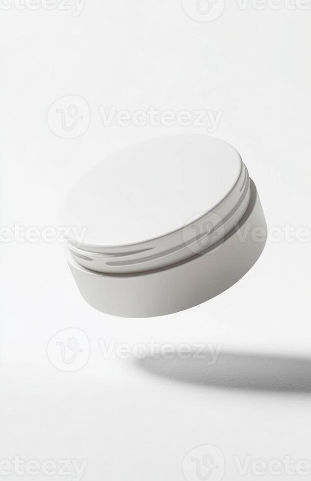 A plain, round cosmetic jar floating at an angle in mid-air, with smooth lighting and subtle reflections on its surface, isolated on white photo
