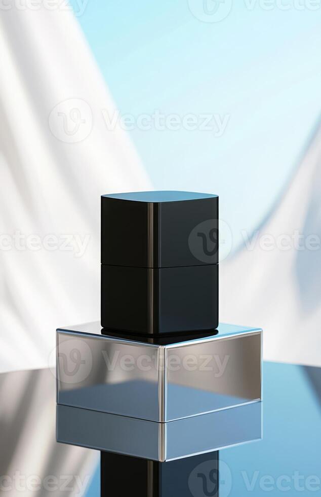 A black box sitting on top of a silver box photo