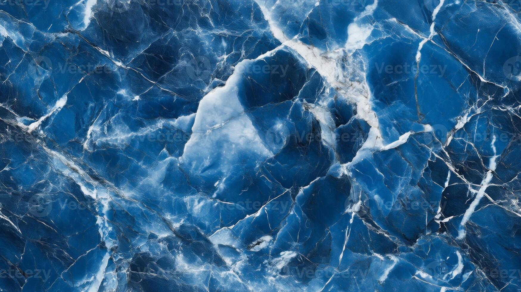A close-up top view of blue marble with contrasting white and grey veins, adding a cool, serene feel to the design photo
