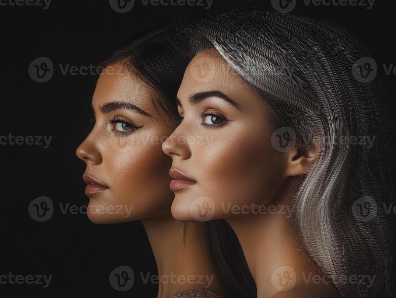 Portrait of two beautiful women of different ages, looking in different directions, showcasing elegance and diversity in appearance photo