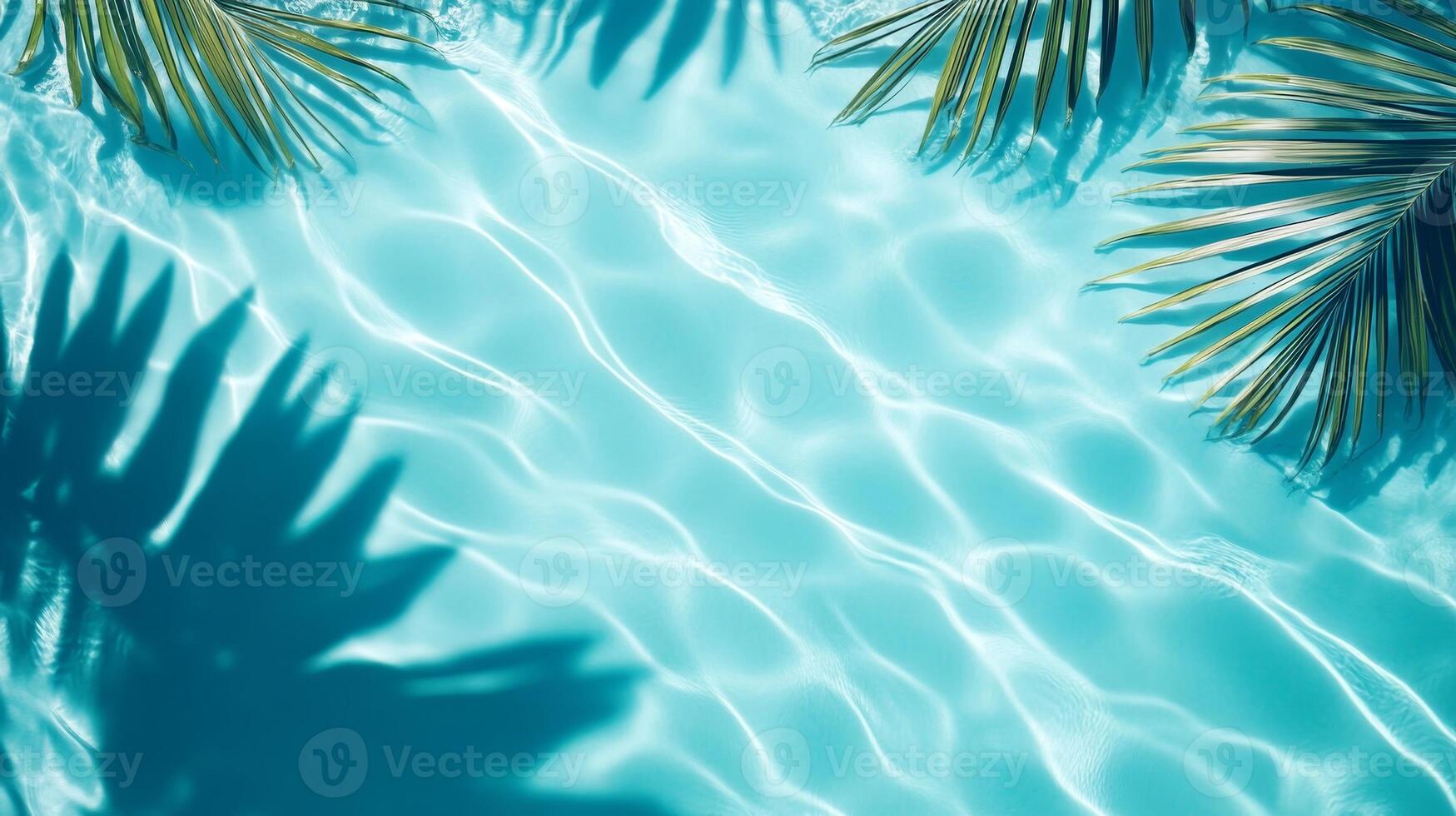 Gentle aqua waves with tropical leaves casting shadows on a bright blue background, rippling water pool texture top view photo