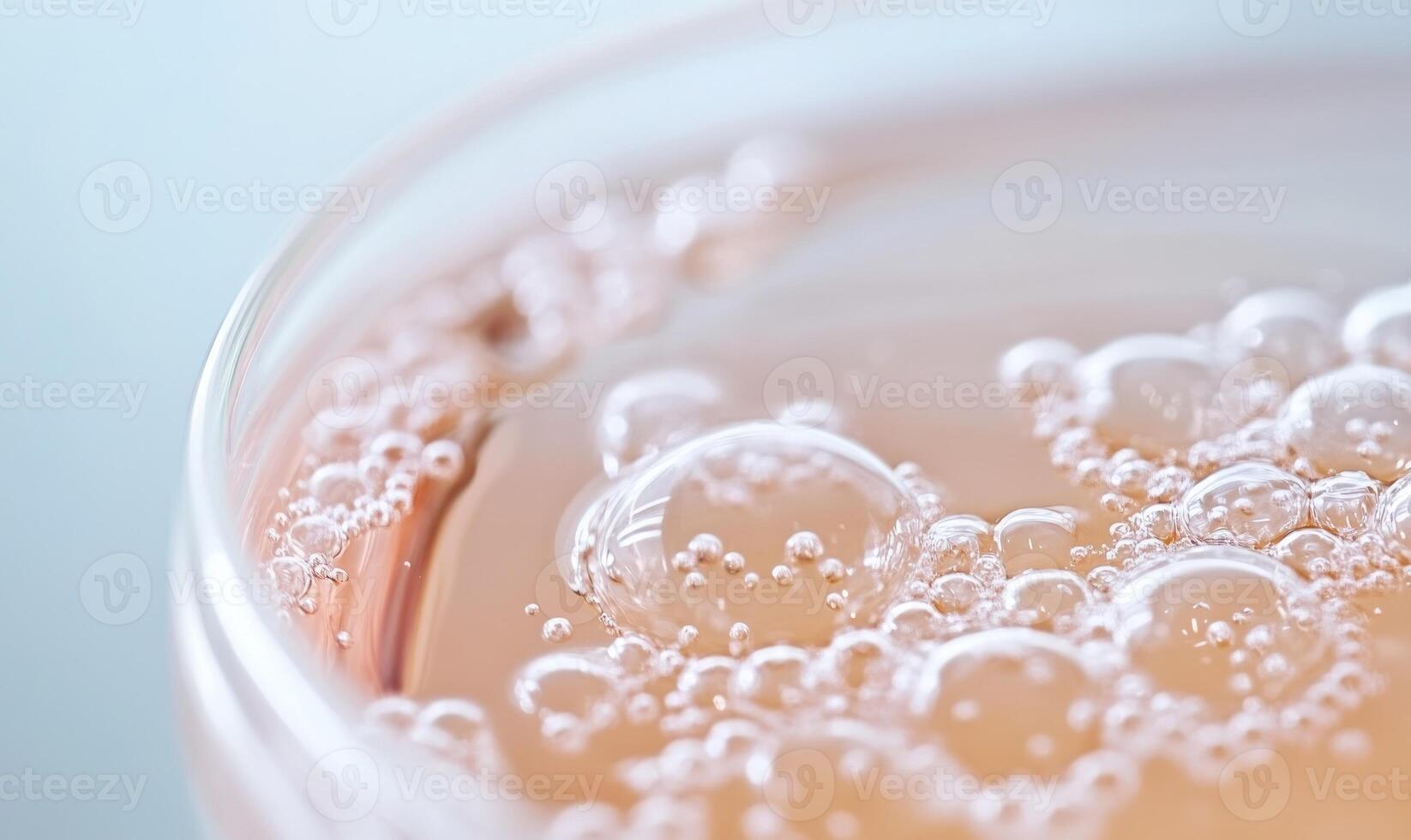 Close-up of tablet in water, effervescent bubbles forming photo