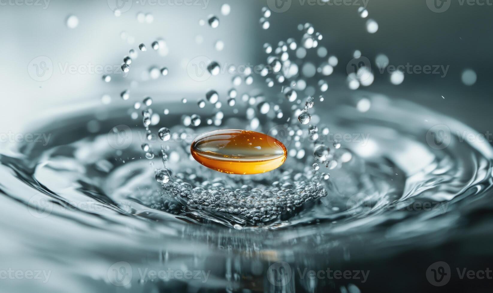 Close-up view of a dissolving pill, effervescence, clear water photo