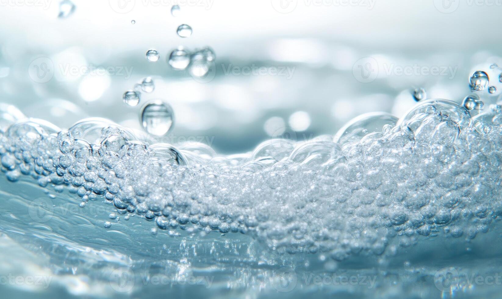 Dissolving tablet releasing tiny bubbles in water, close-up shot photo