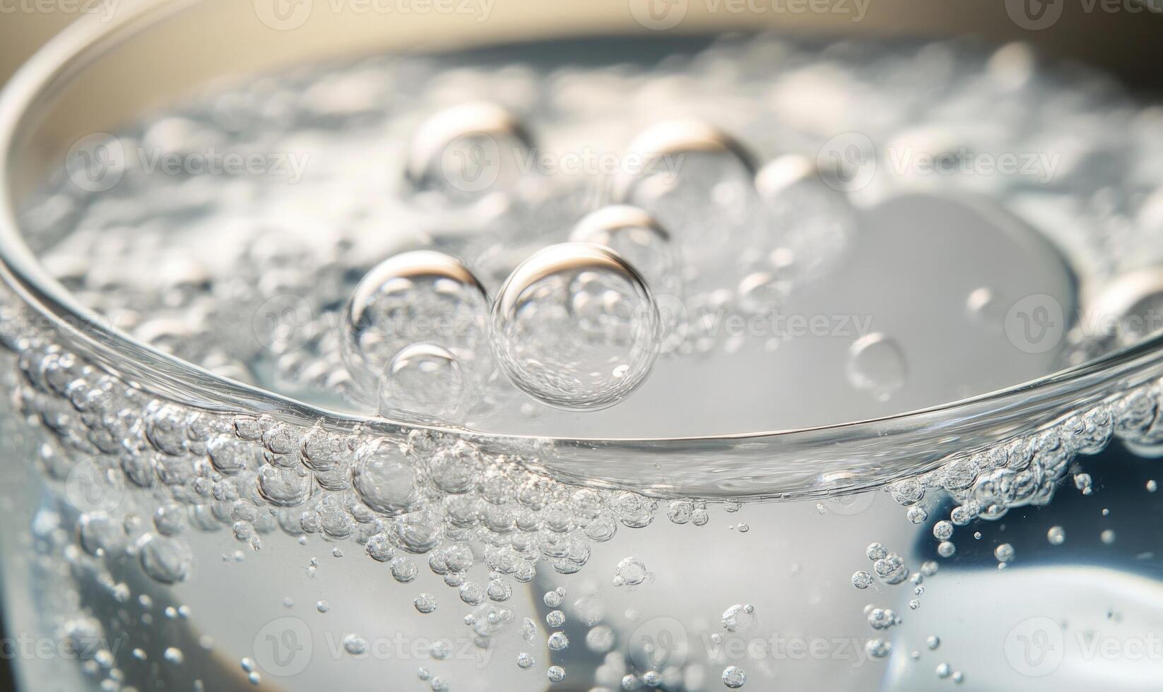 Close-up of tablet in water, effervescent bubbles forming photo