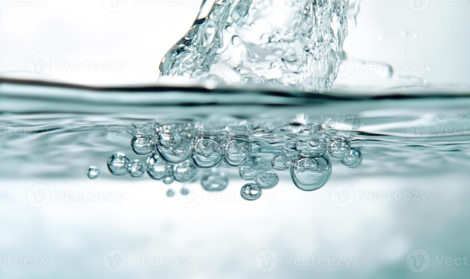 Close-up of dissolving tablet in water, effervescent bubbles forming photo