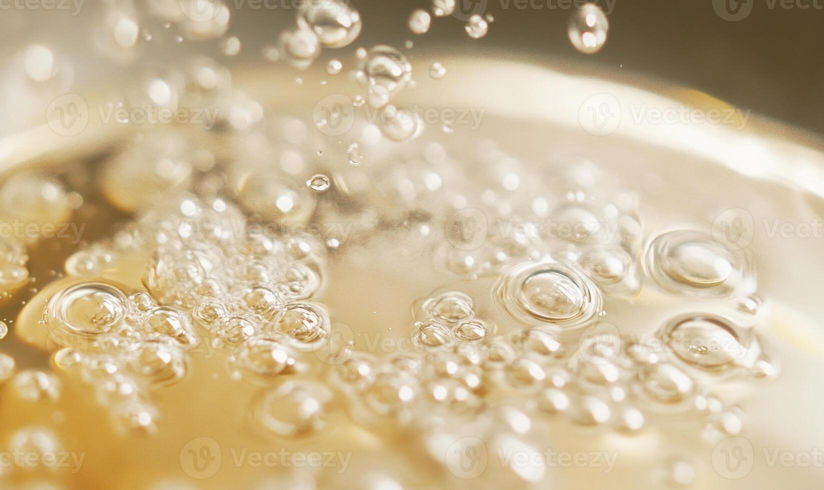 Close-up of dissolving tablet in water, effervescent bubbles forming photo