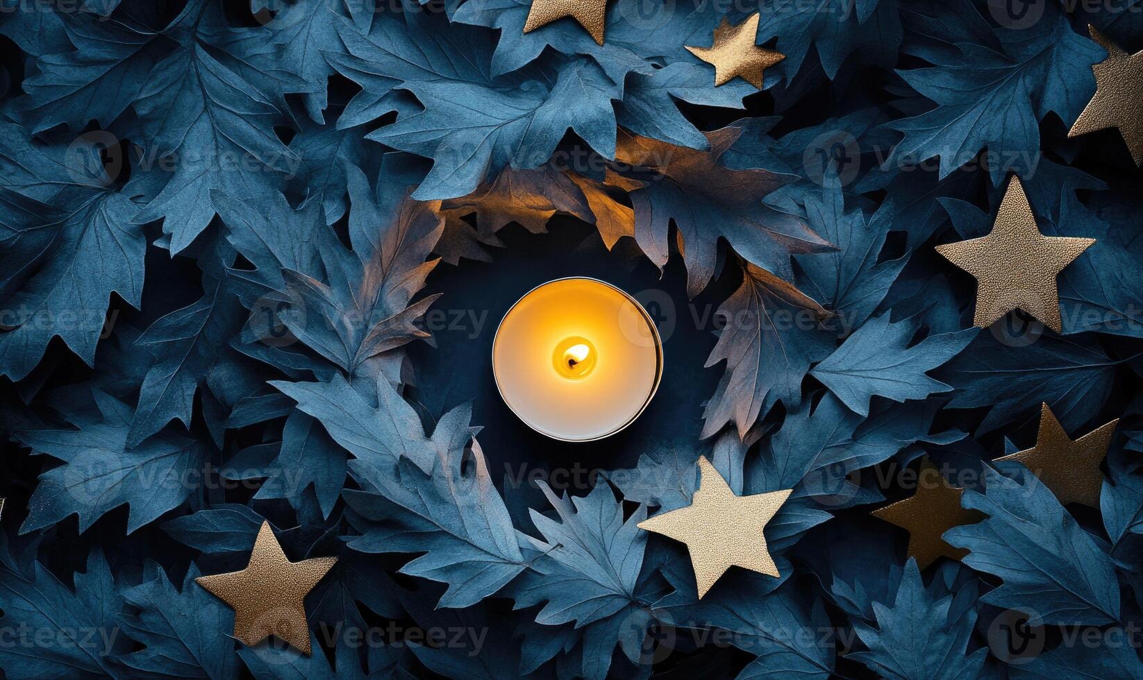 A candle is lit in the middle of a wreath of leaves photo