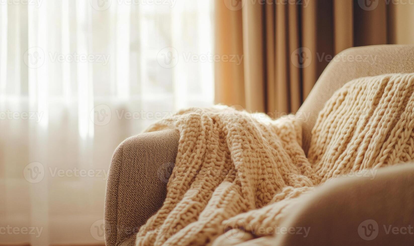 A couch with a white blanket draped over it photo