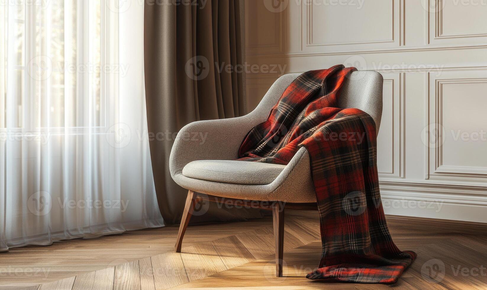 A chair with a red and white plaid blanket draped over it photo
