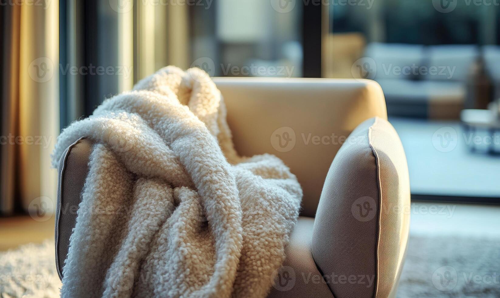 A white chair with a white blanket draped over it photo