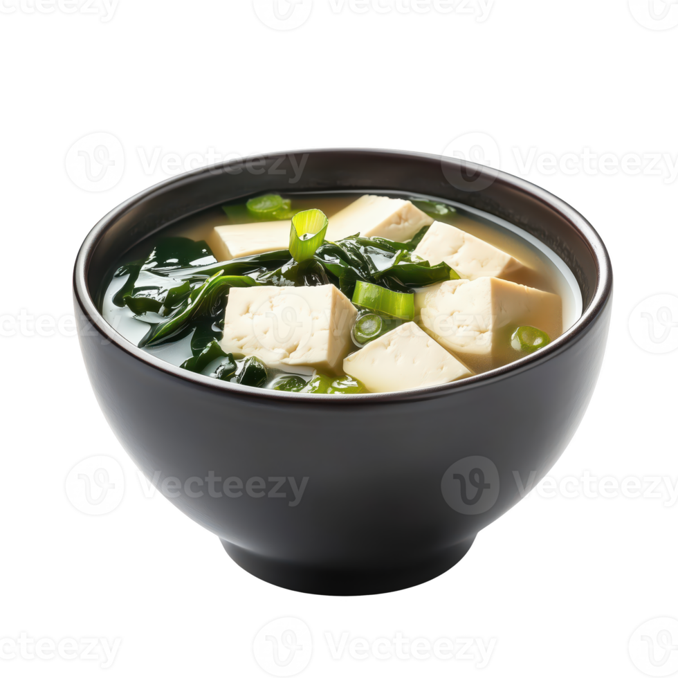Delicious tofu soup with fresh green onion and seaweed, served in a black bowl, perfect for a healthy meal or snack. png