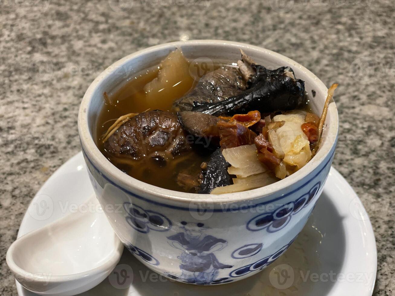 Black Chicken Stewed in Chinese Herbal Soup photo