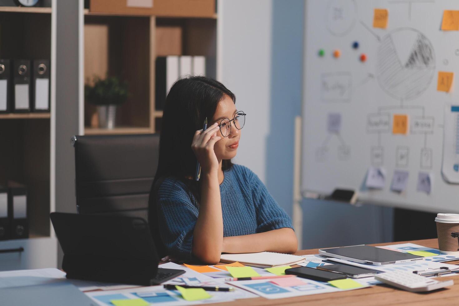 The designer team is designing the uxui system to make the uxui system work well on new phones and support system updates. Website development concept UI UX front end designer photo