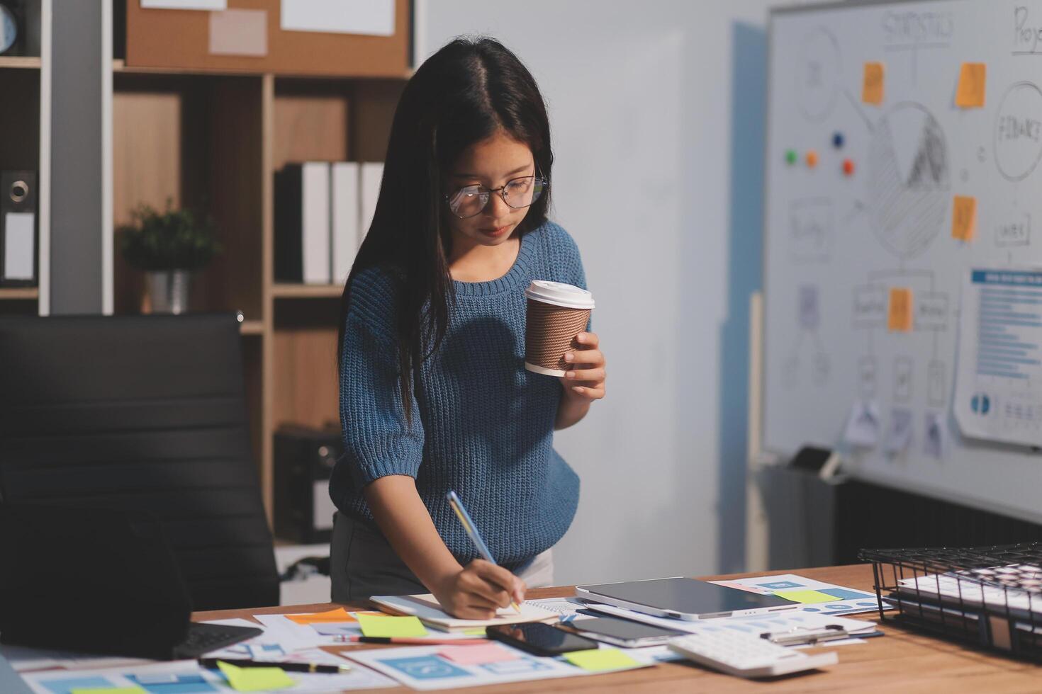 The designer team is designing the uxui system to make the uxui system work well on new phones and support system updates. Website development concept UI UX front end designer photo