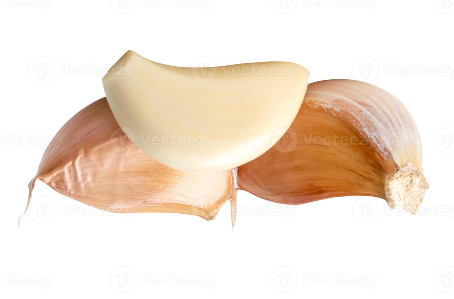 Peeled garlic cloves in stack isolated on white background with clipping path photo