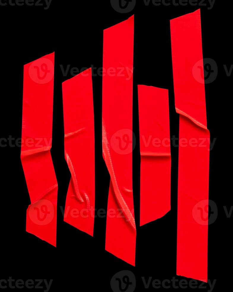 Top view set of wrinkled red scotch tape or adhesive vinyl tape in stripes isolated on black background with clipping path photo