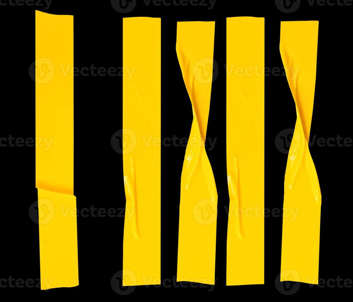 Top view set of wrinkled or crumpled yellow adhesive vinyl tape or cloth tape in stripes shape isolated on black background with clipping path photo