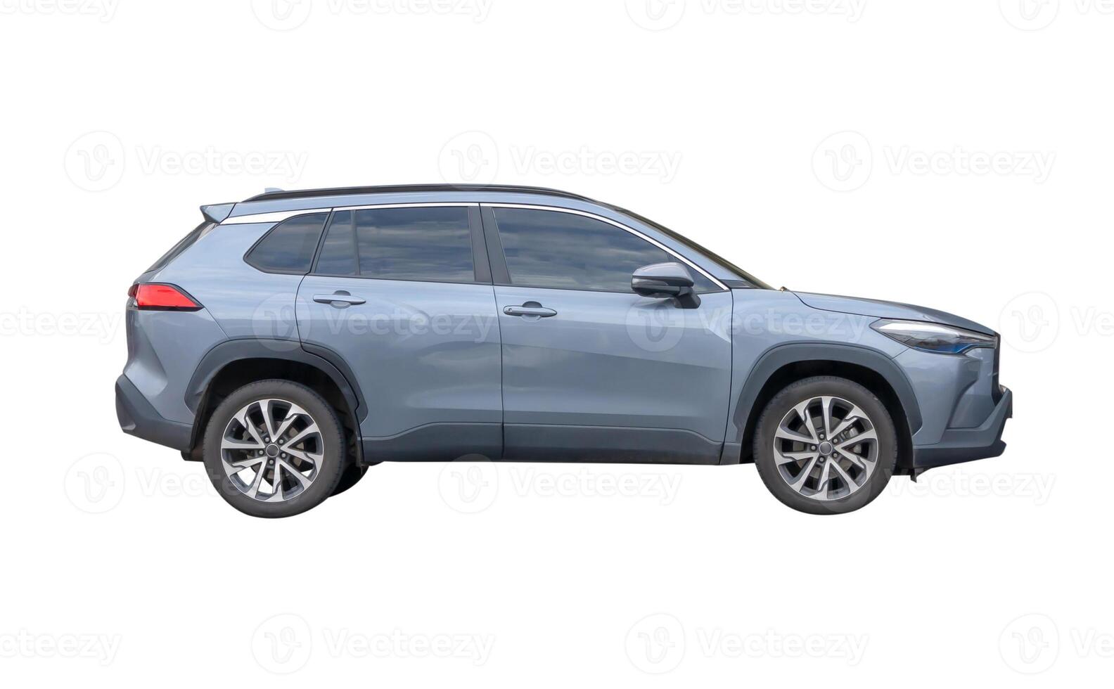 Side view of light blue hatchback car isolated on white background with clipping path photo