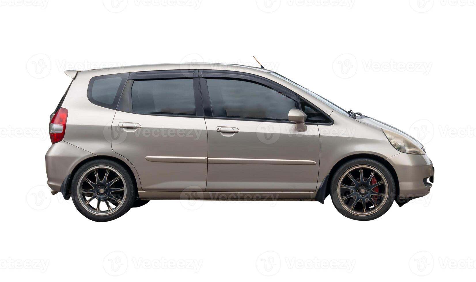 Side view of gray or grey hatchback car isolated on white background with clipping path photo