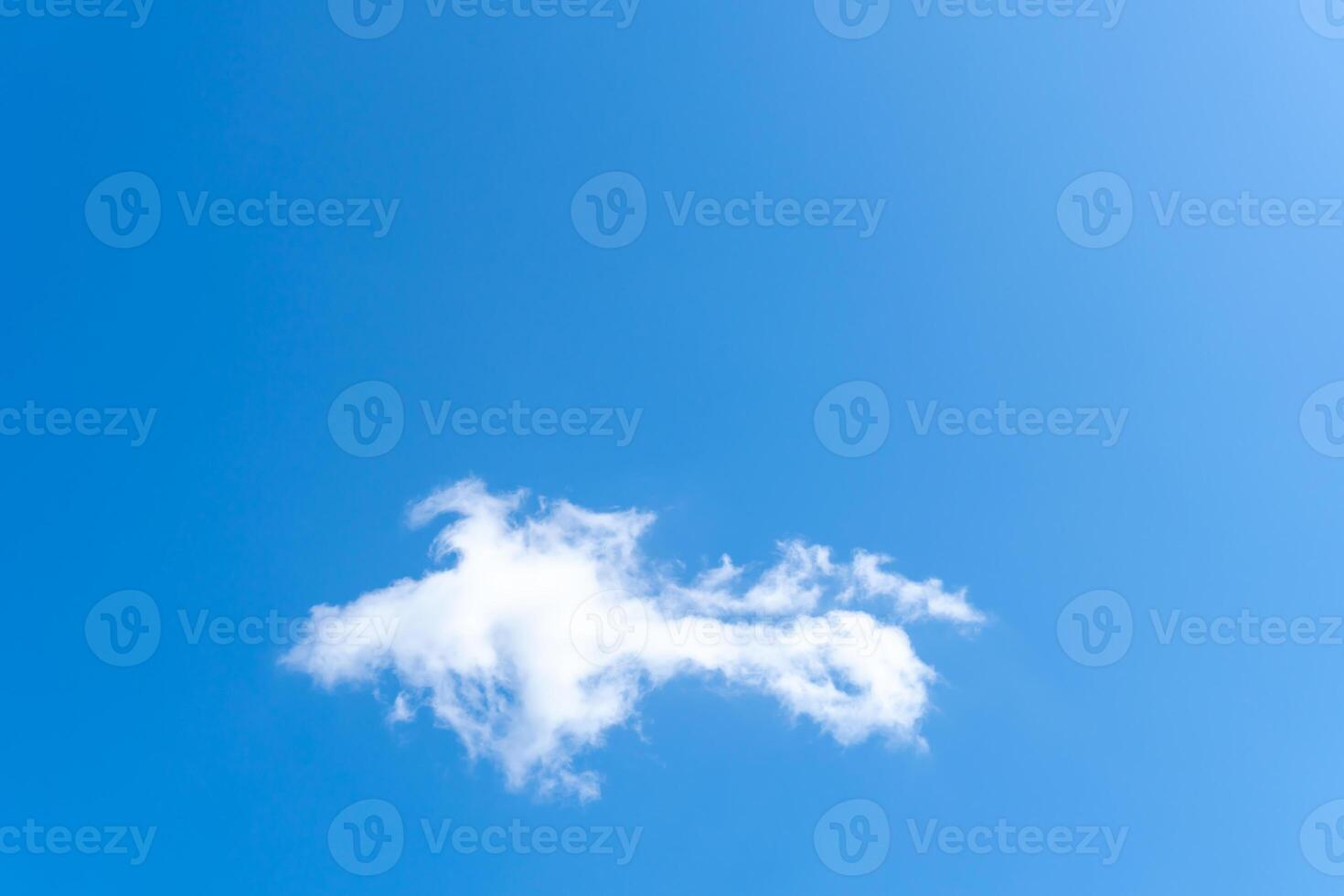 Low angle view of beautiful blue sky with strange shape of clouds in the morning or evening used as natural background texture in decorative art work photo