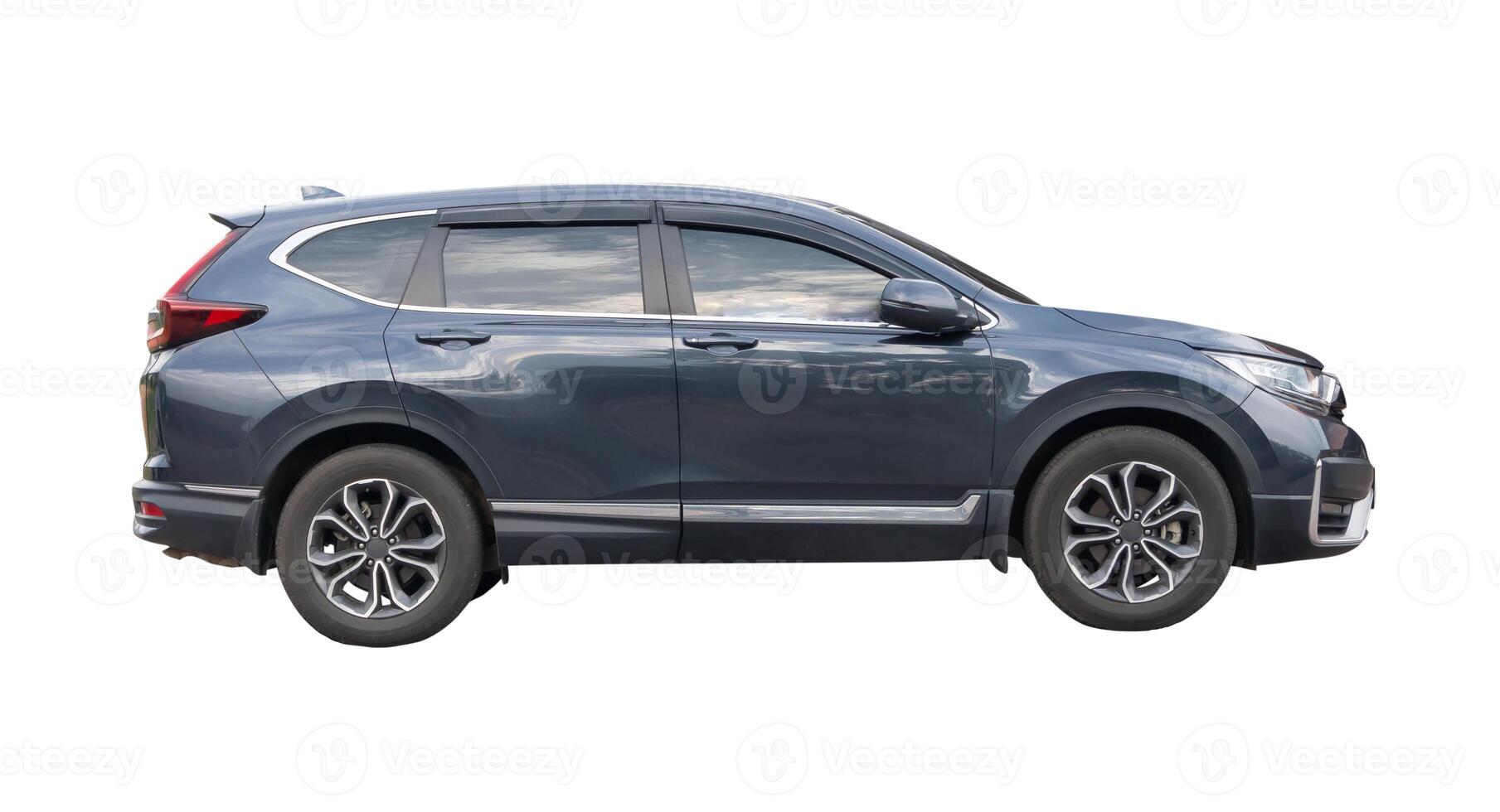 Side view of dark blue hatchback car isolated on white background with clipping path photo
