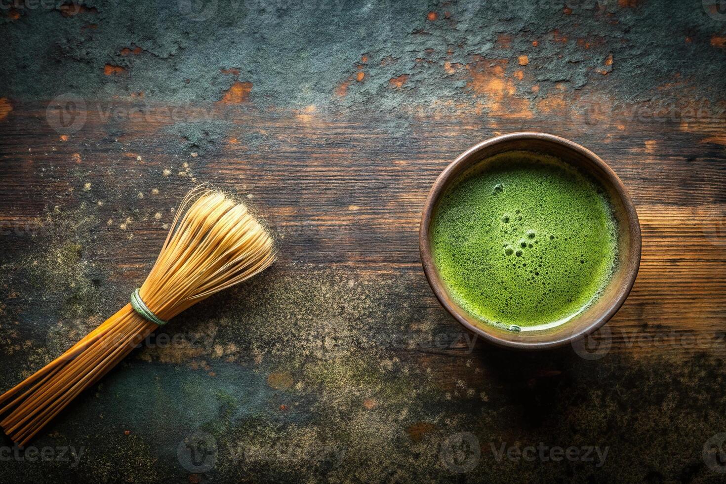 Overhead shot of matcha tea cup on rustic background embodying wabi sabi aesthetics photo