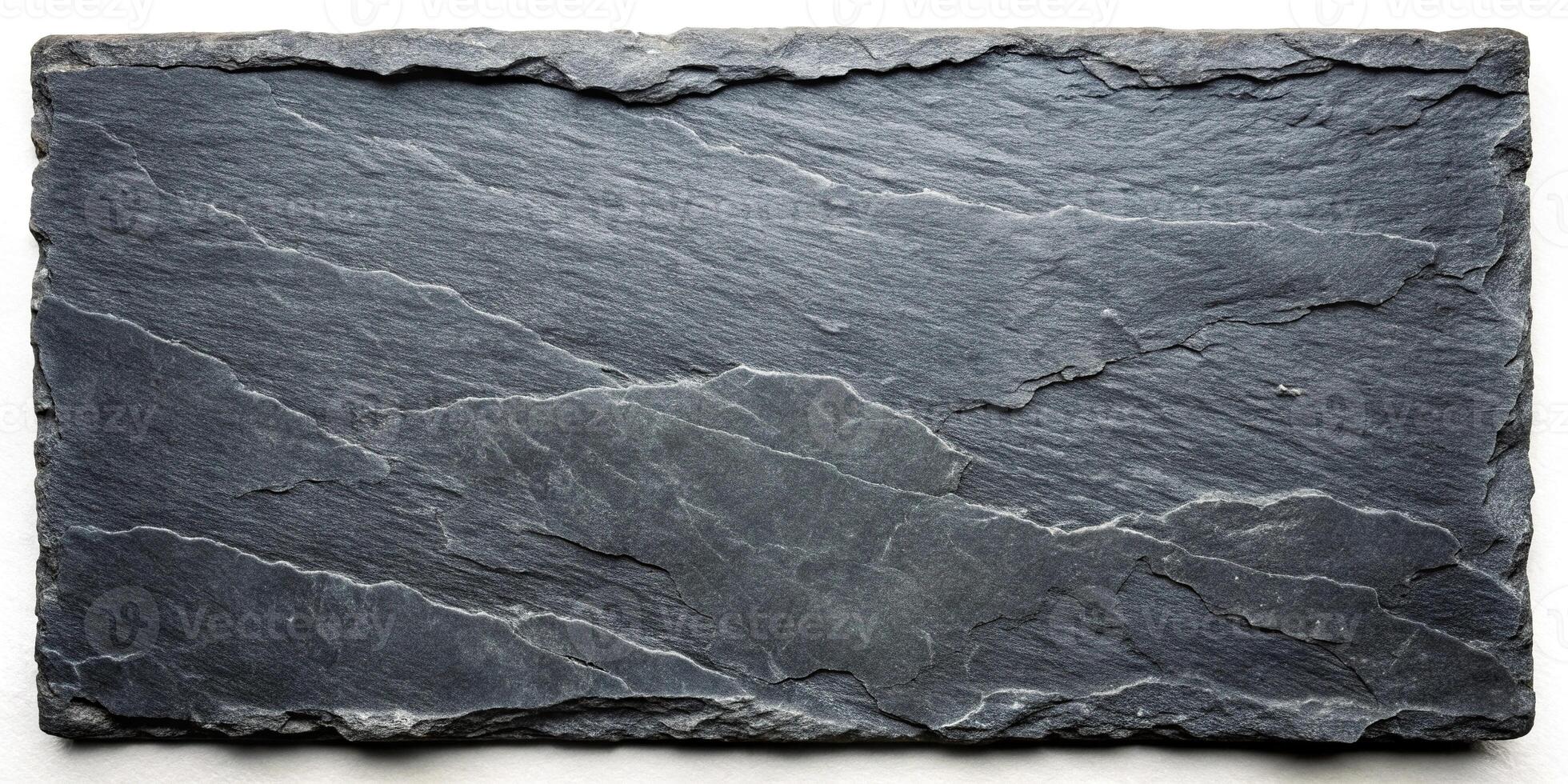 Dark grey slate rock surface texture with weathered details photo