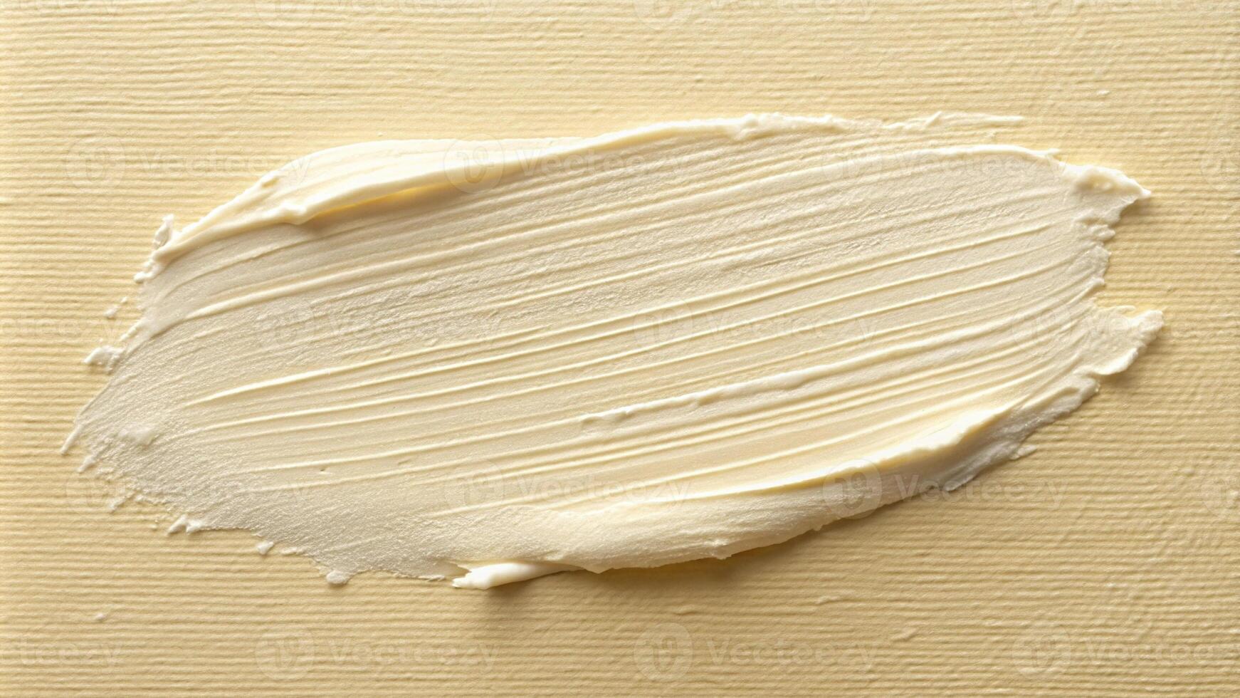 Cream texture on vanilla yellow beige background photo