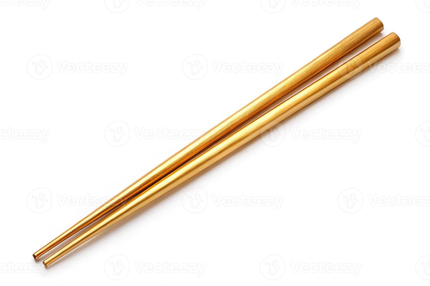 Medium shot image of gold chopsticks isolated on white background, with clipping path photo