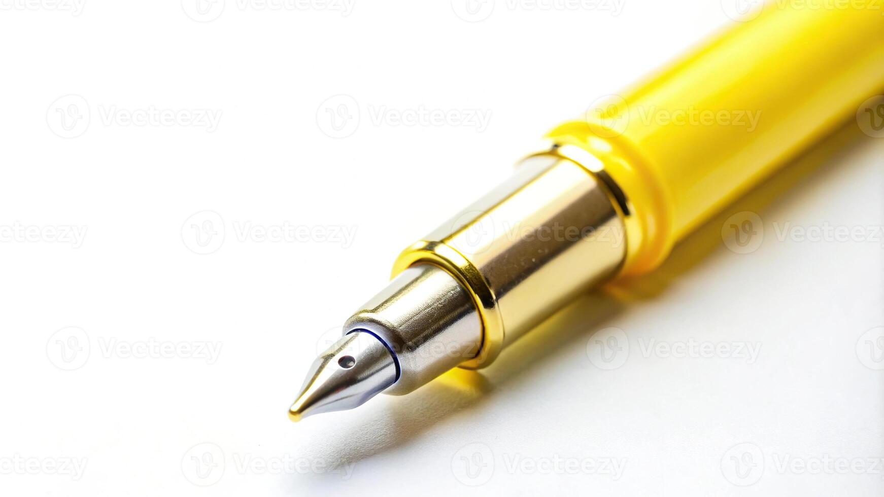 Macro yellow ink pen with an isolated white background copy photo