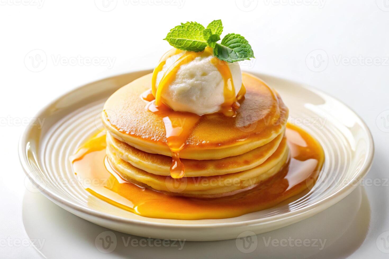 Luxurious pancakes with orange sauce and ice cream on white background photo
