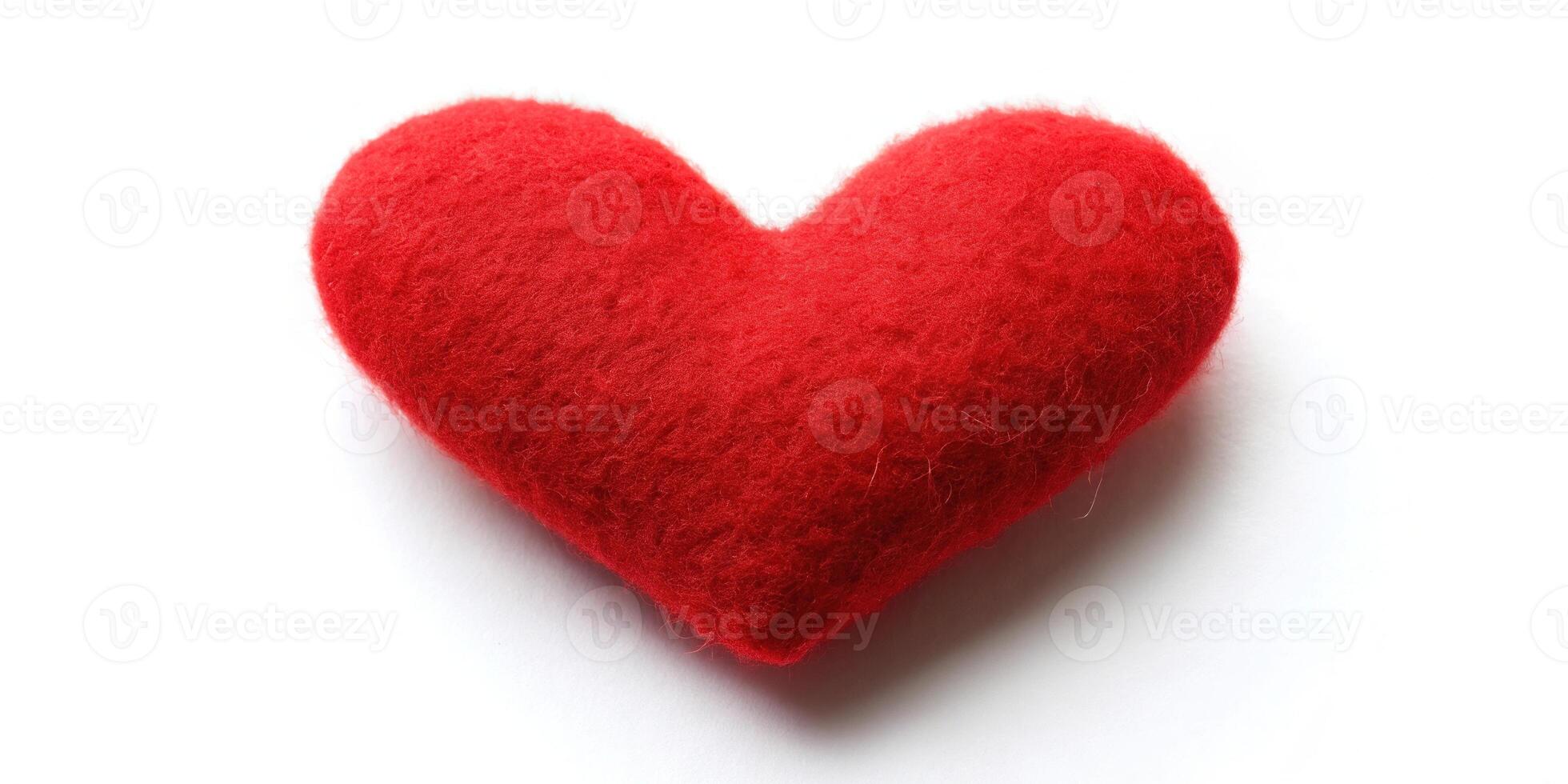 Macro red heart on white background photo