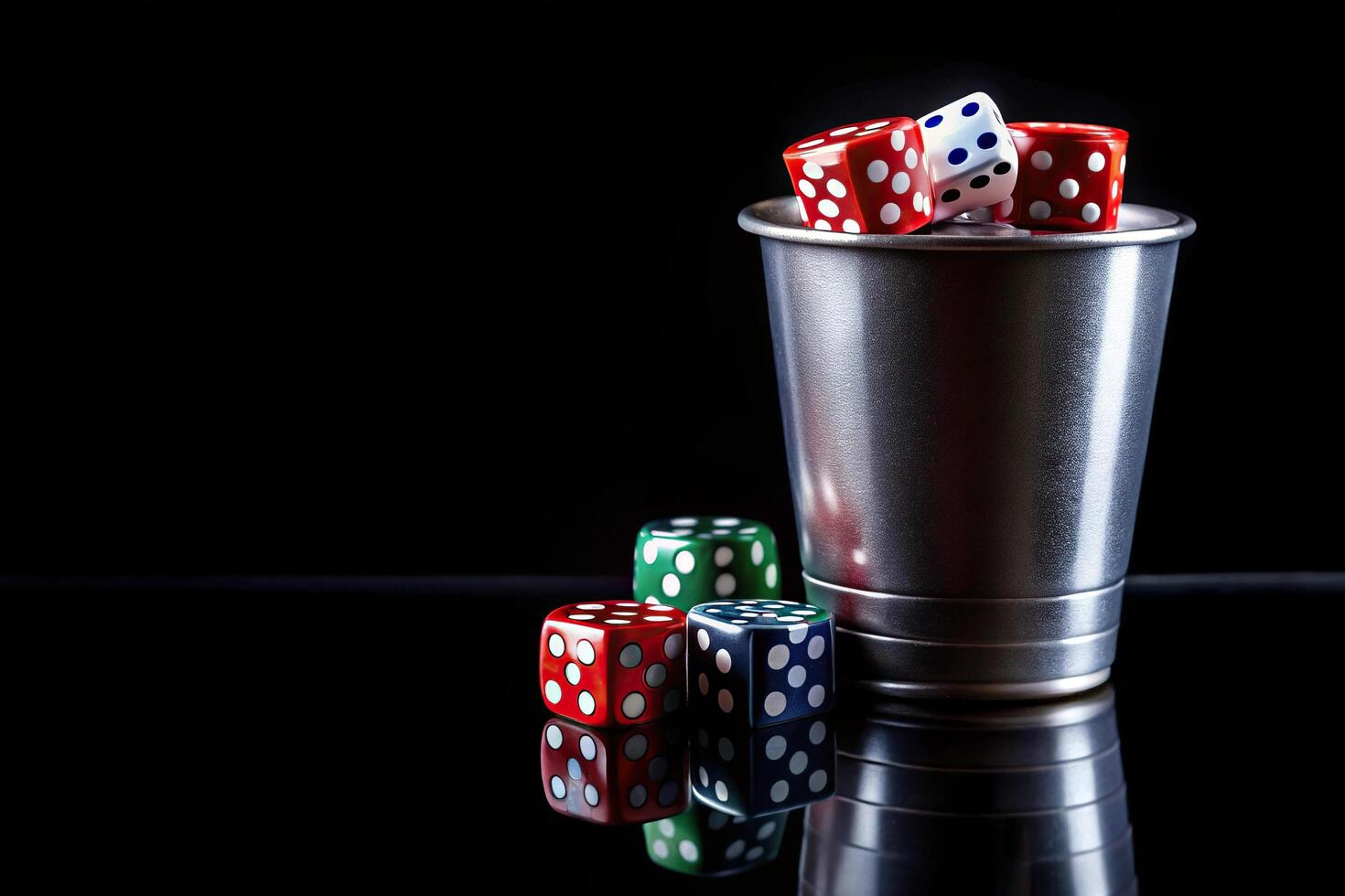 Poker cup with dice on a black background in forced perspective photo
