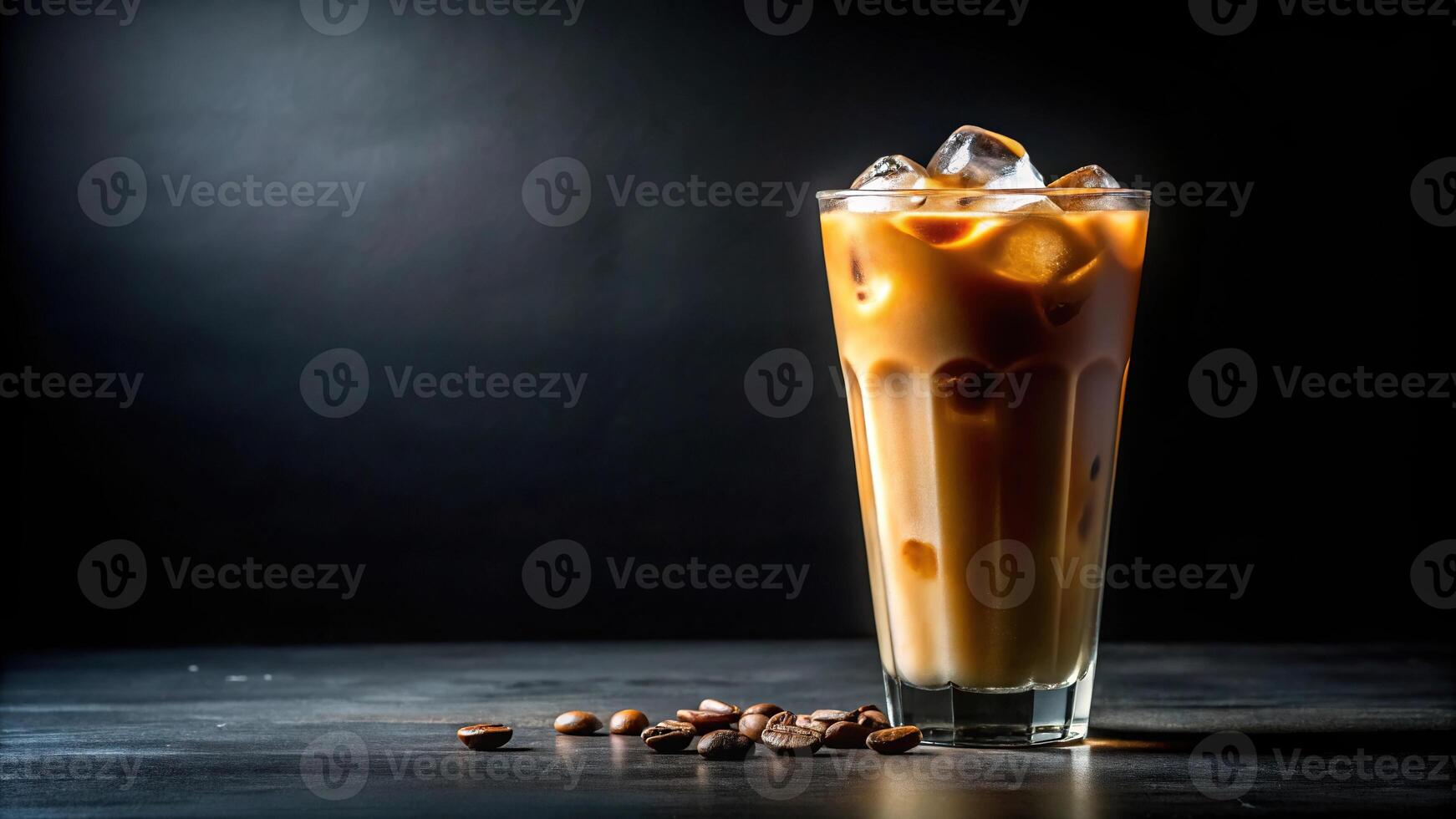 Refreshing iced coffee with coffee beans on black background photo