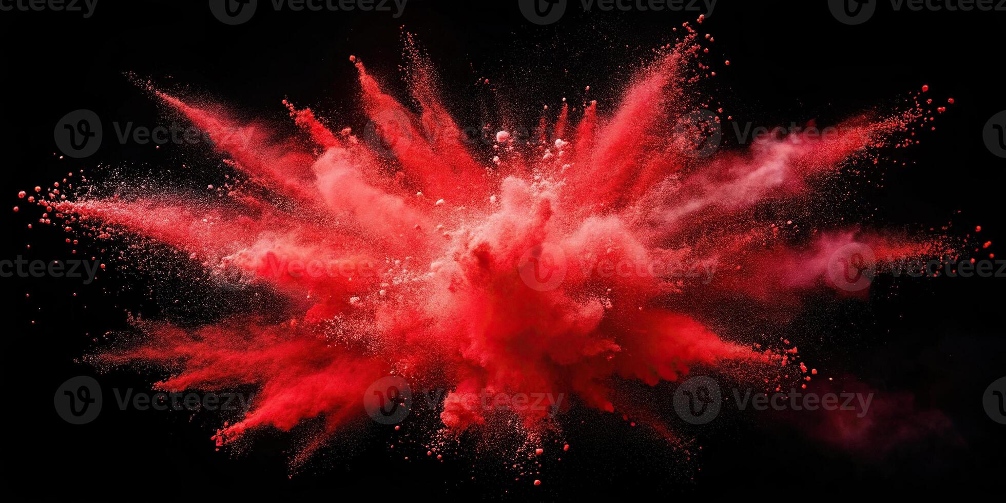Red powder exploding in high angle view on black background, creating red clouds photo