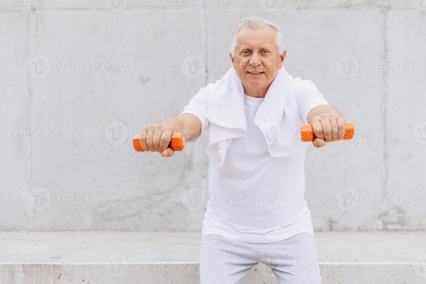 Senior Man Exercising with Dumbbells Outdoors, Promoting Active Lifestyle and Fitness photo