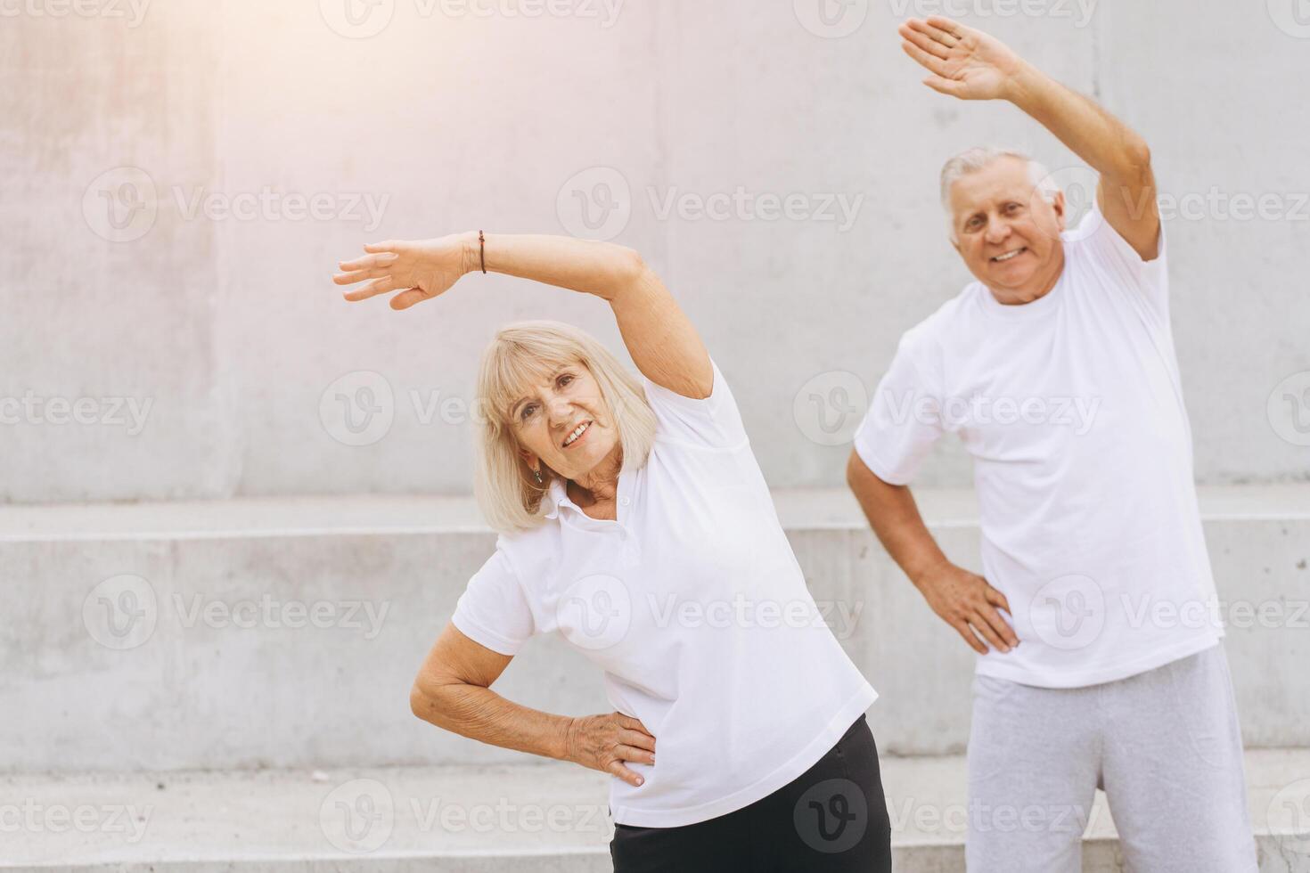 Senior Couple Exercising Outdoors for a Healthy Lifestyle photo