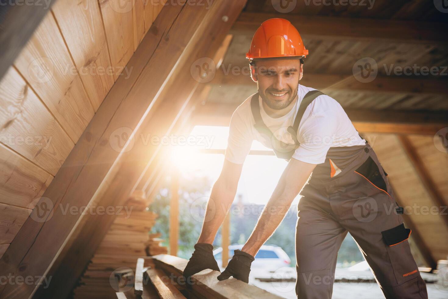 Process of construction new and modern modular house. Worker man in special protective uniform wear working on building development industry of energy efficient property. photo